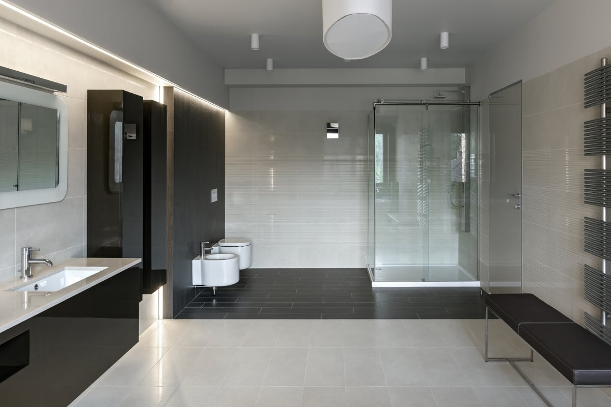 Premium walk-in tub with stone panel surround installation in Greensboro NC